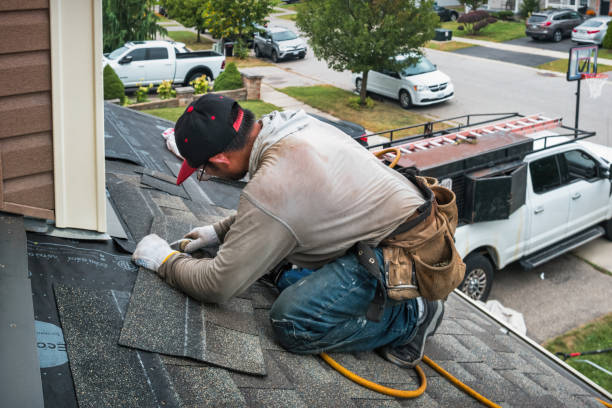 Professional Gutter Installation technician working in Jackson, TN